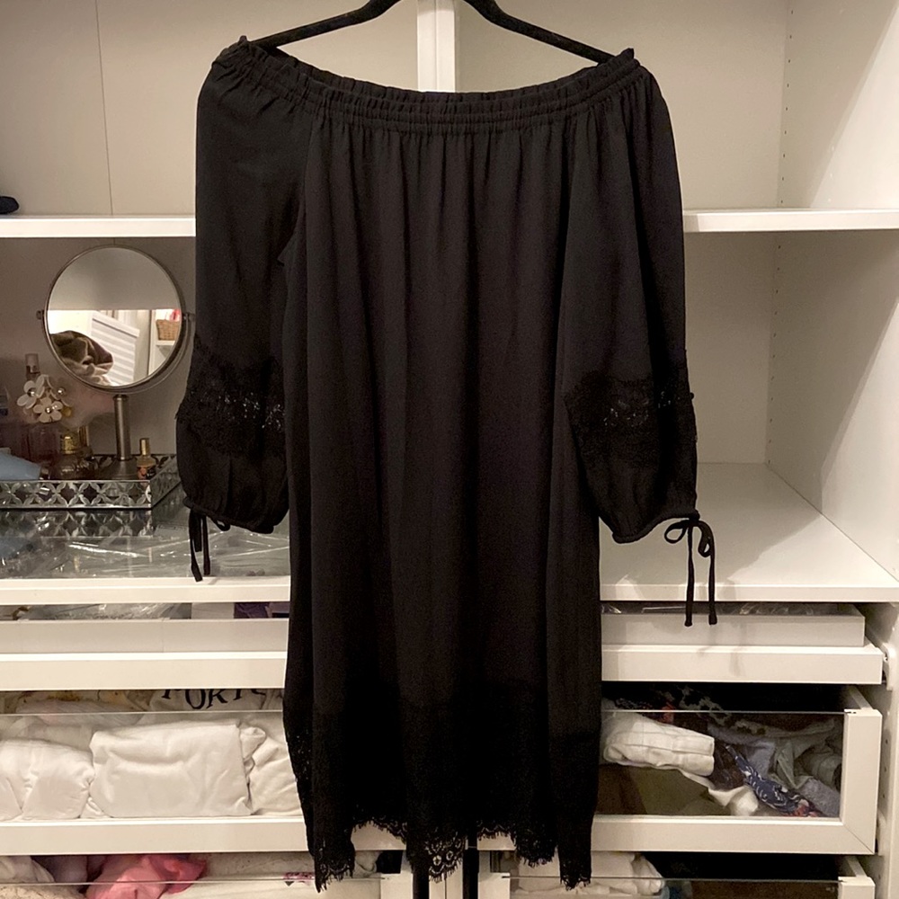 Off the shoulder black silky dress with lace detail on sleeves and bottom hem
